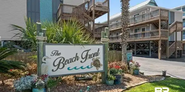 Image 2: Community / neighborhood sign with a wooden deck
