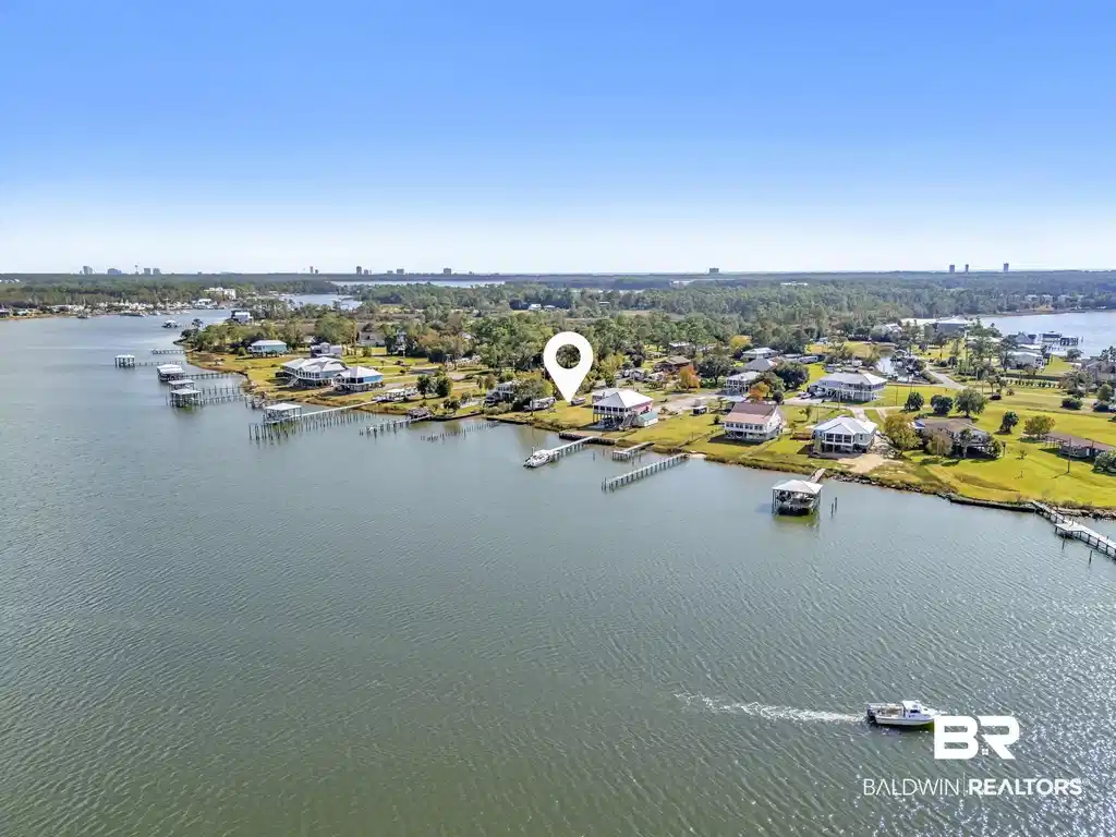 Image 1: Bird's eye view of a nearby body of water