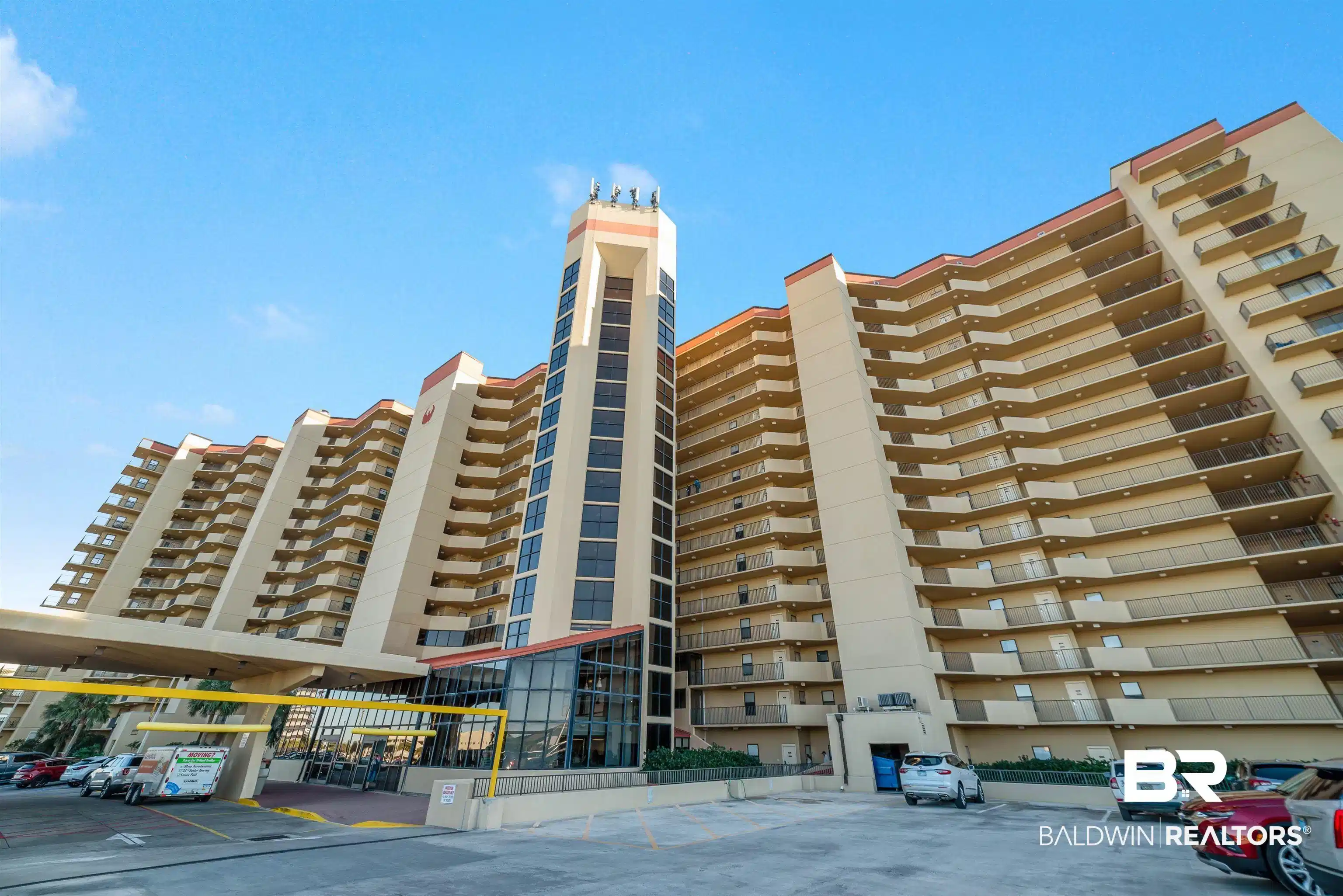 Image 1: View of apartment building / complex