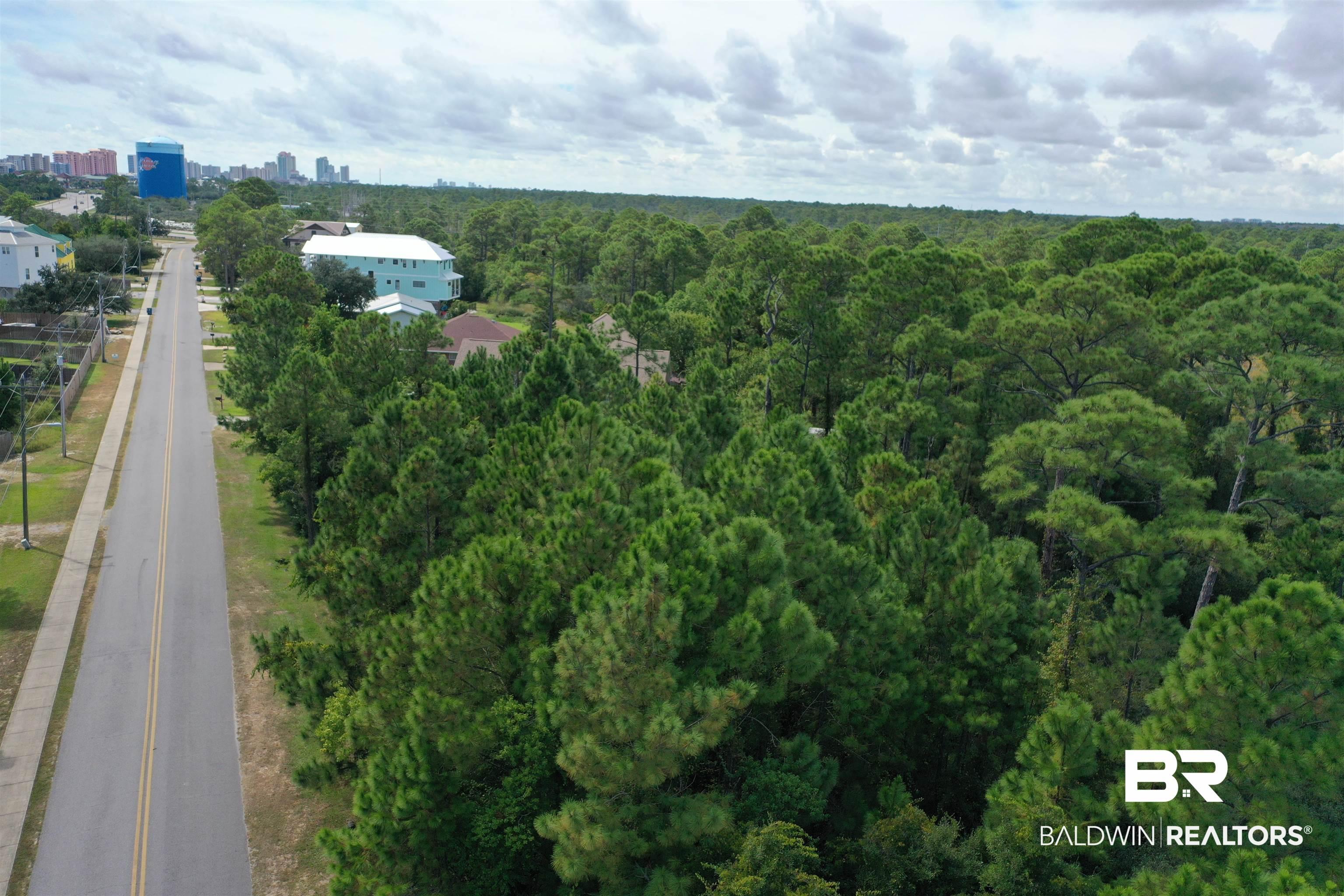 Image 4: Aerial view of property and surrounding area featuring skyline
