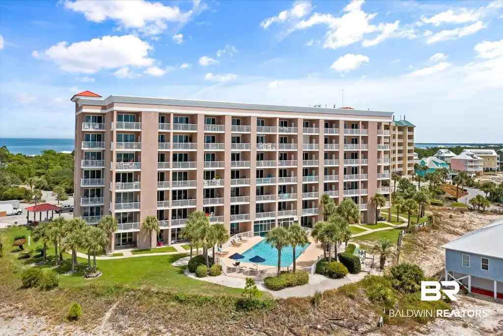 Image 1: View of apartment building / complex