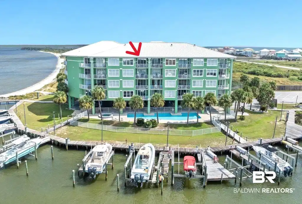 Image 1: Top floor unit with water views all around