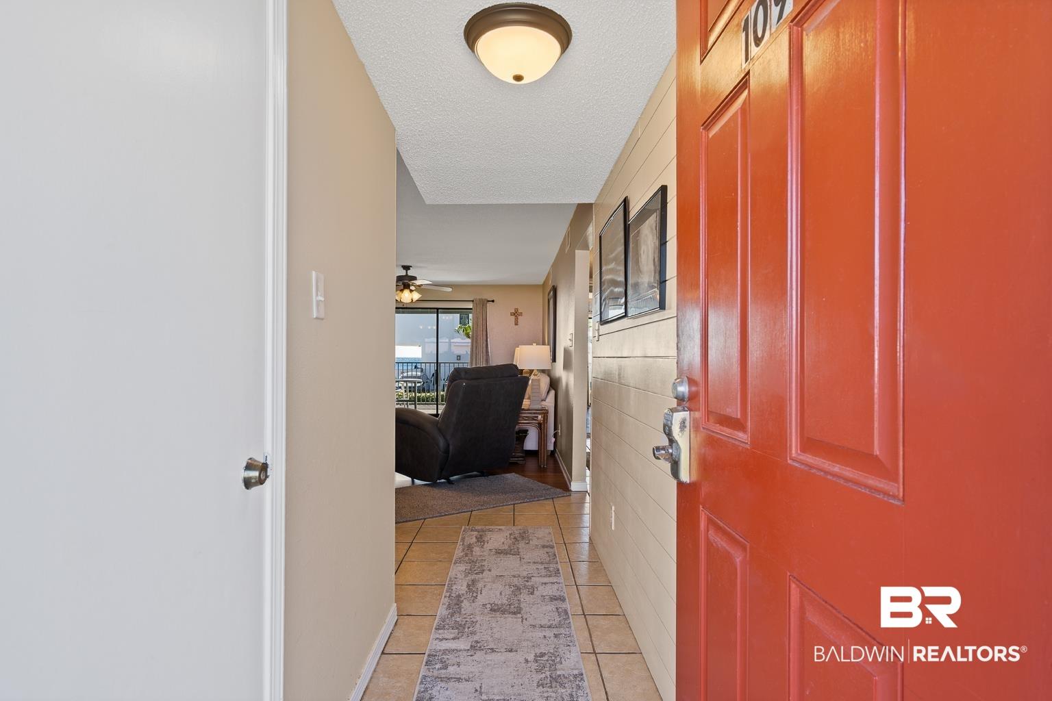 Image 3: Interior space featuring a textured ceiling and ceiling fan