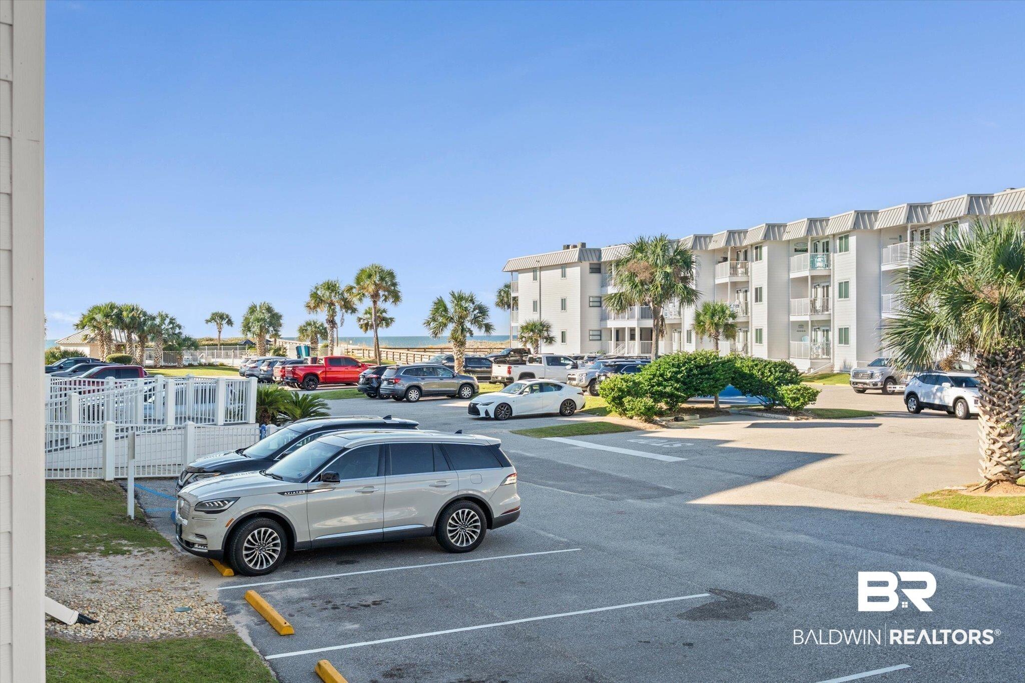 Image 4: View of uncovered parking lot