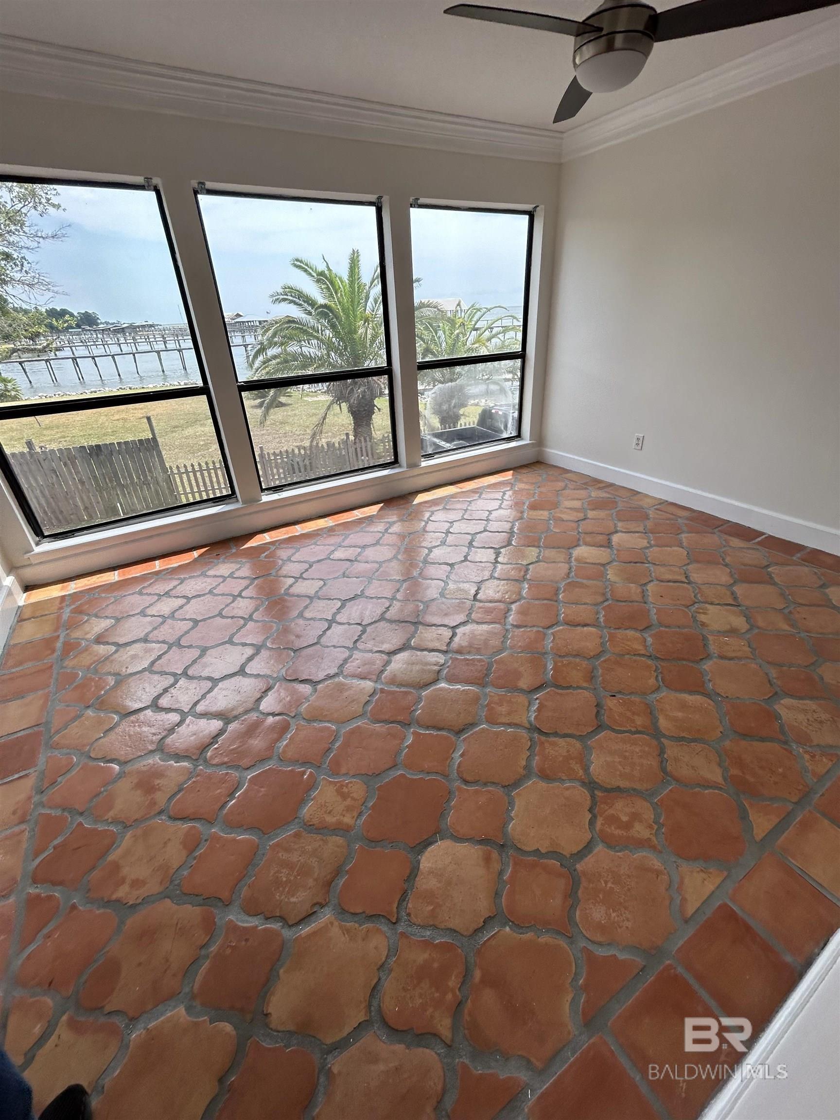 Image 4: Interior space with ceiling fan and plenty of natural light
