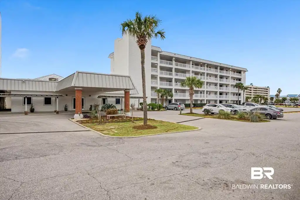 Image 1: View of apartment building / complex