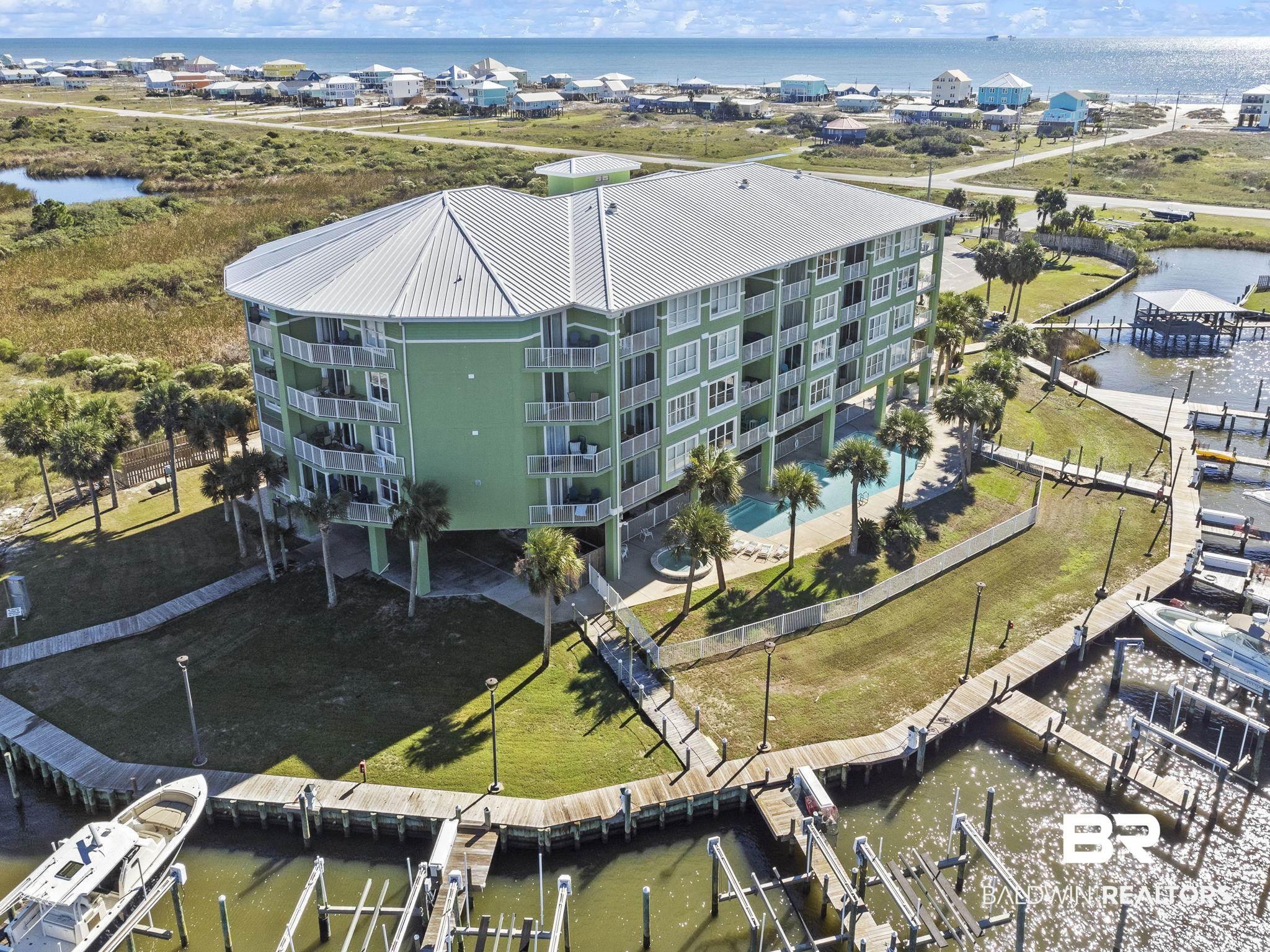 Image 4: Aerial view featuring a water view