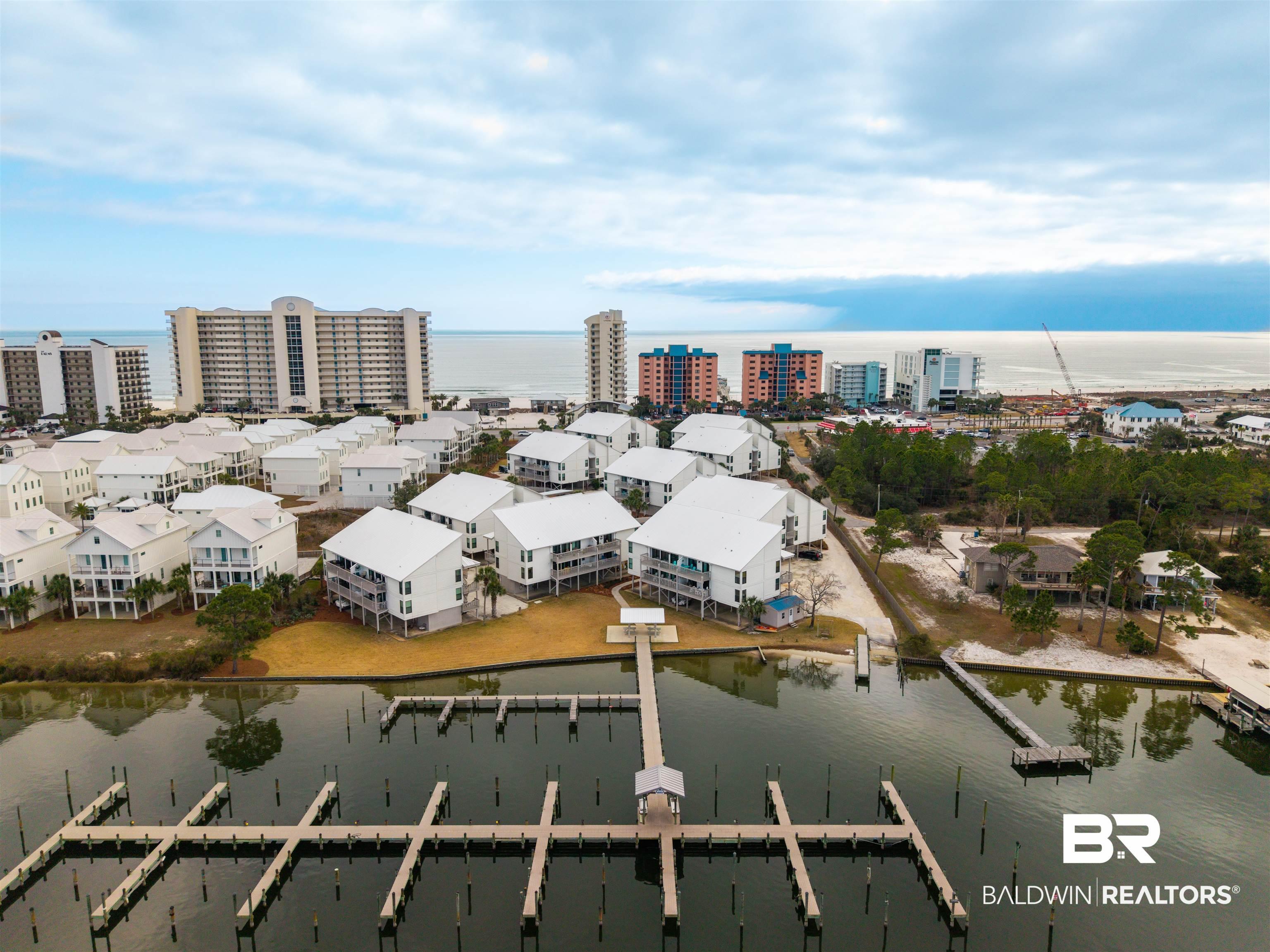 Image 1: View of urban area with a nearby body of water