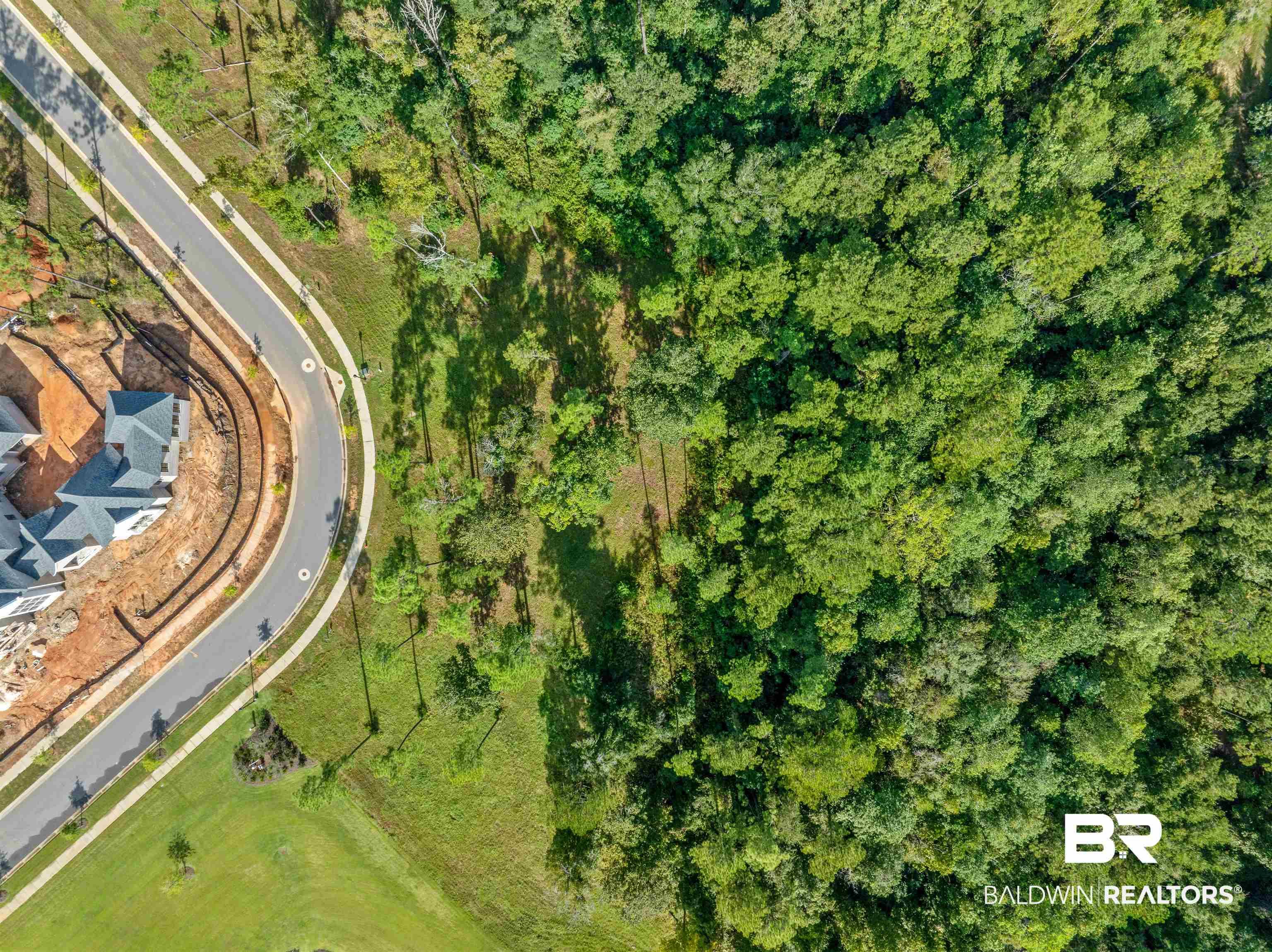 Image 2: Aerial view of property and surrounding area