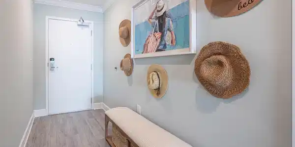 Image 2: Entryway featuring wood finished floors and ornamental molding