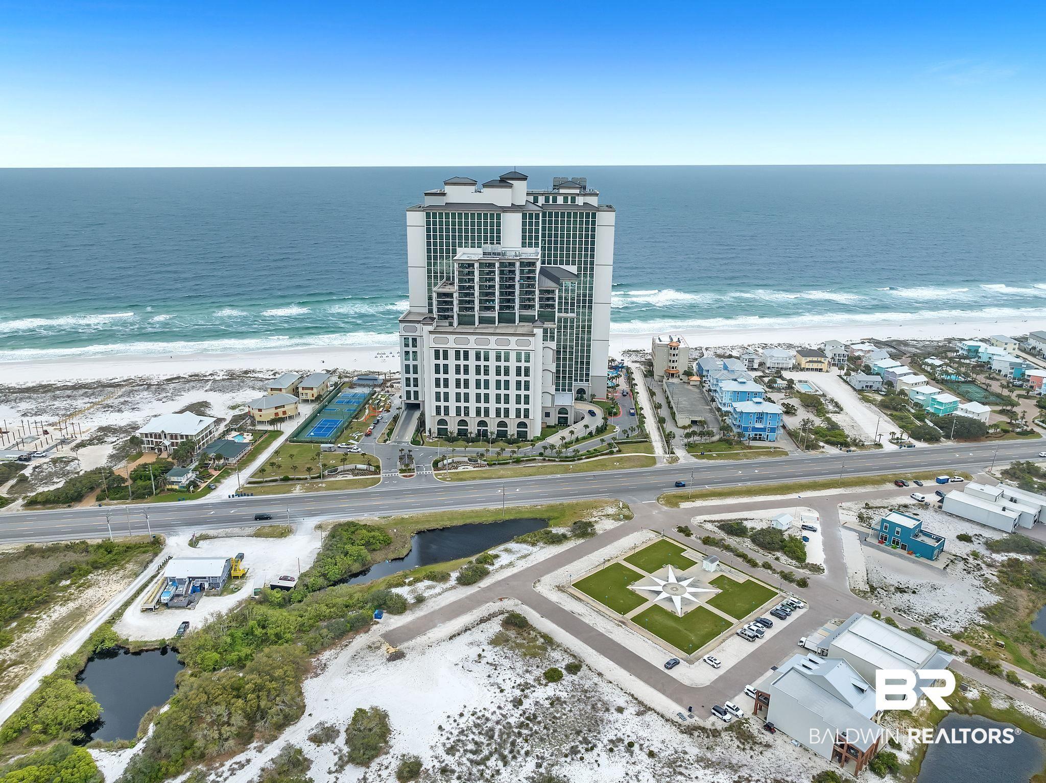 Image 2: View of urban area with expansive coastline