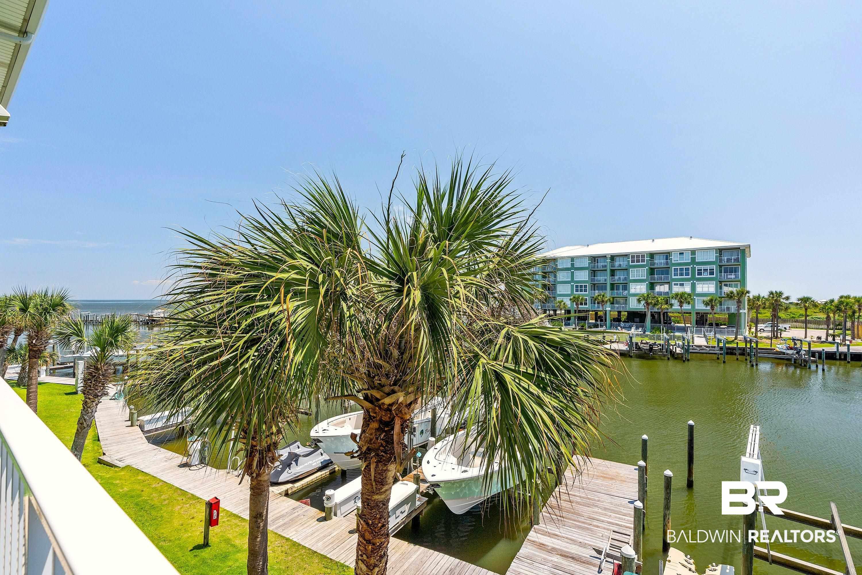 Image 2: Dock area featuring a water view