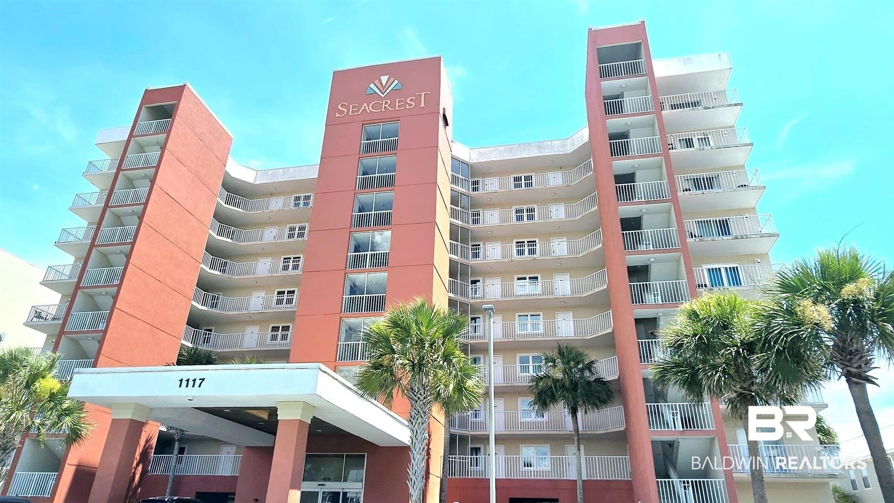 Image 1: View of apartment building / complex