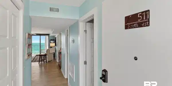 Image 2: Hall with baseboards and light wood-type flooring