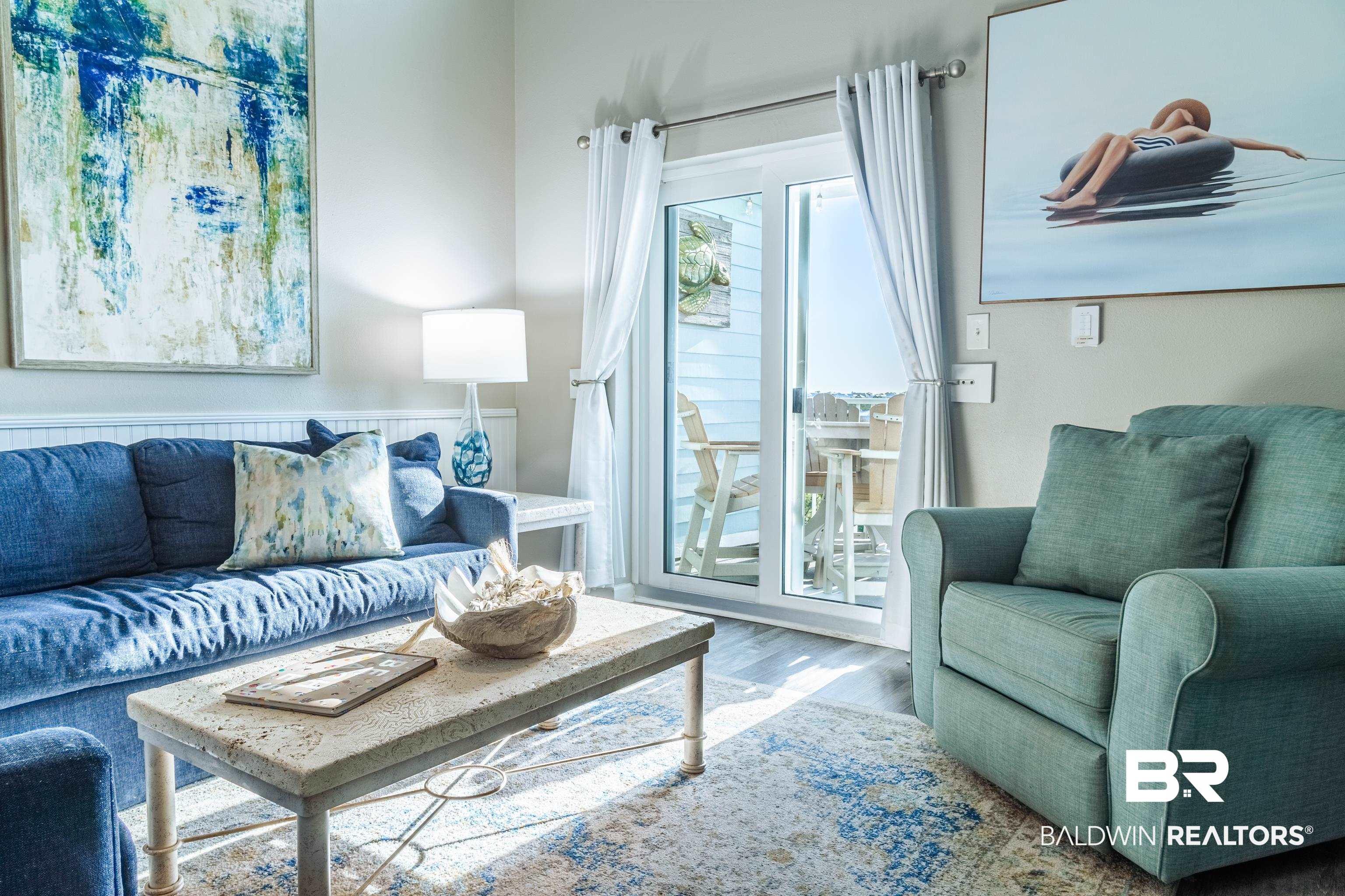 Image 4: Living room with wood finished floors
