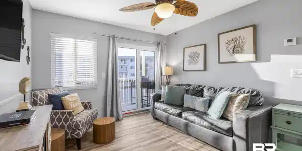 Image 2: Living room featuring wood finished floors and a ceiling fan