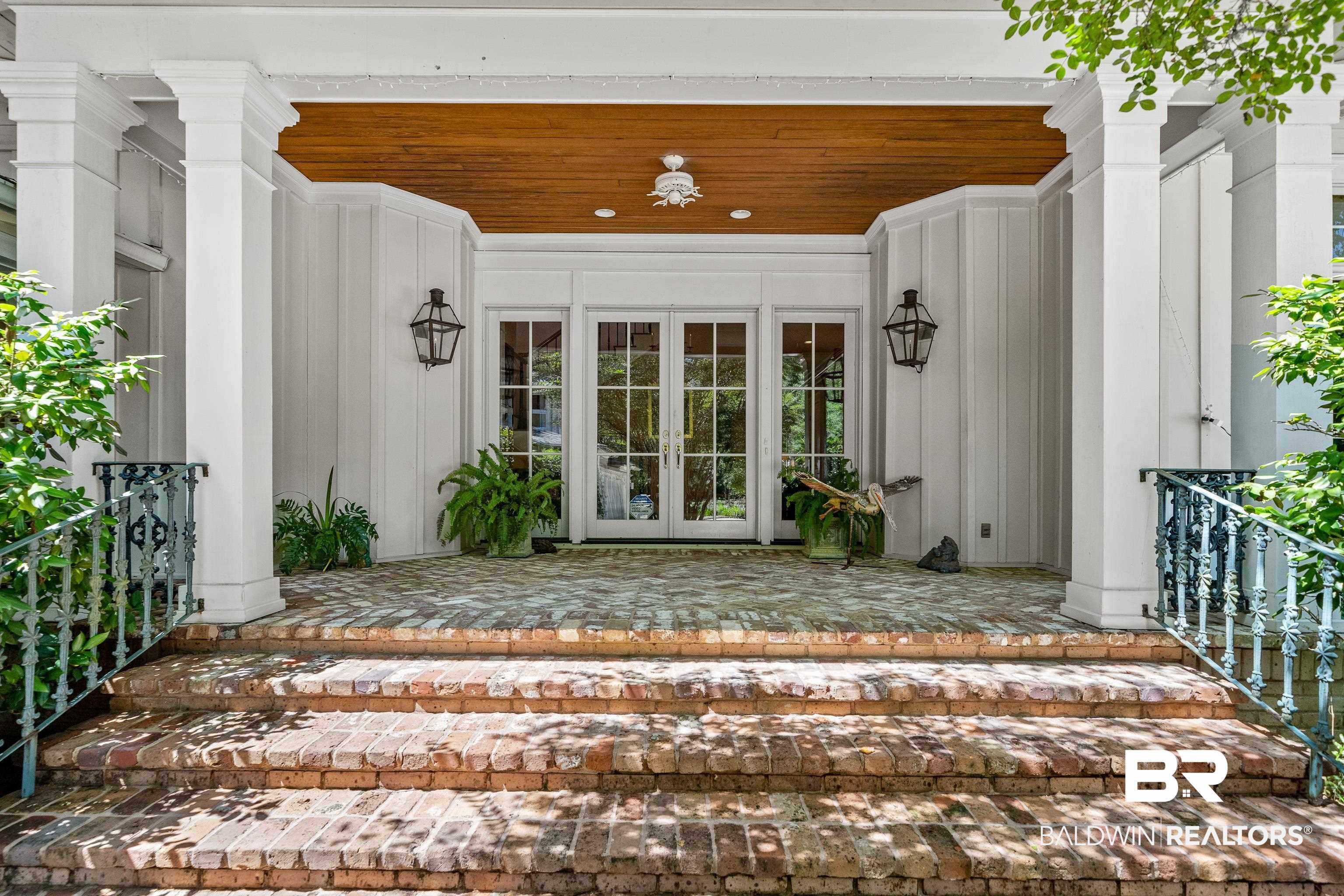 Image 4: Entrance to property with french doors