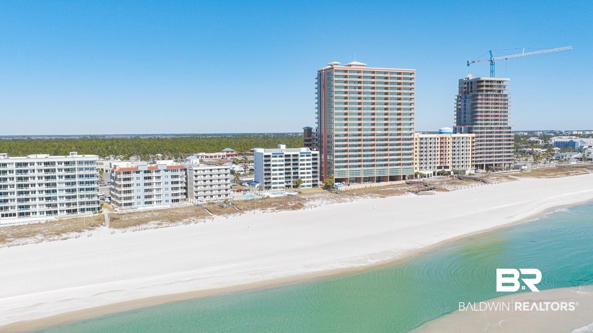 Image 2: View of urban area with expansive coastline