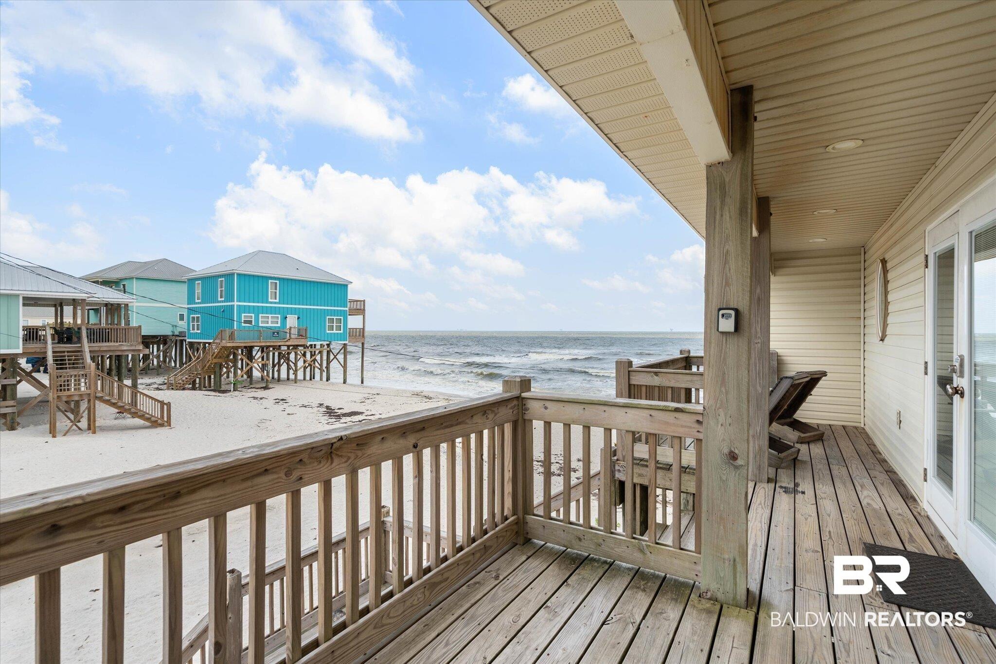 Image 4: Deck with view of water and beach