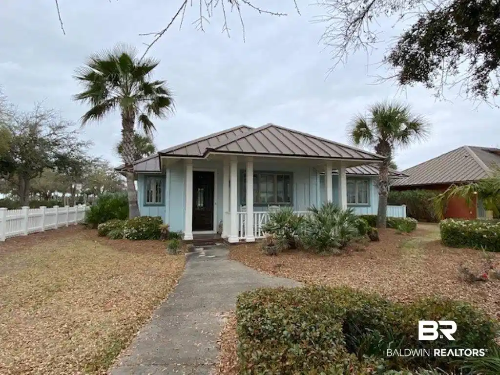 Image 1: View of front of property featuring a porch