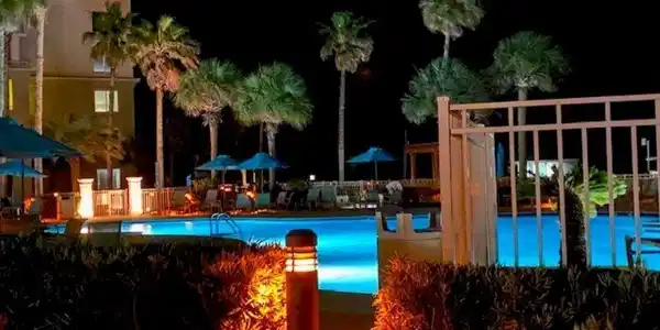 Image 4: View of pool at twilight
