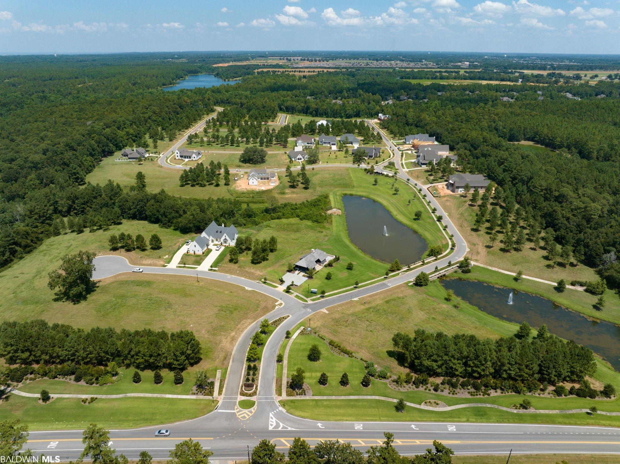Image 1: Drone / aerial view featuring a water view