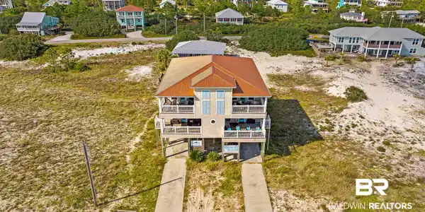 Image 4: Aerial view of property and surrounding area