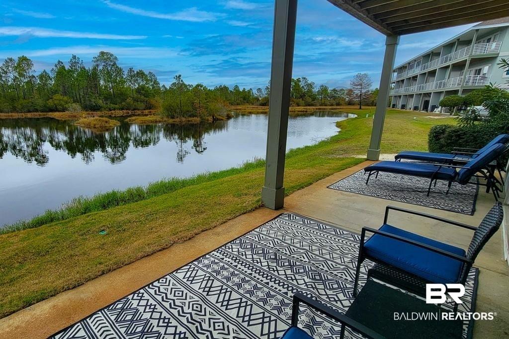 Image 4: View of patio with a water view