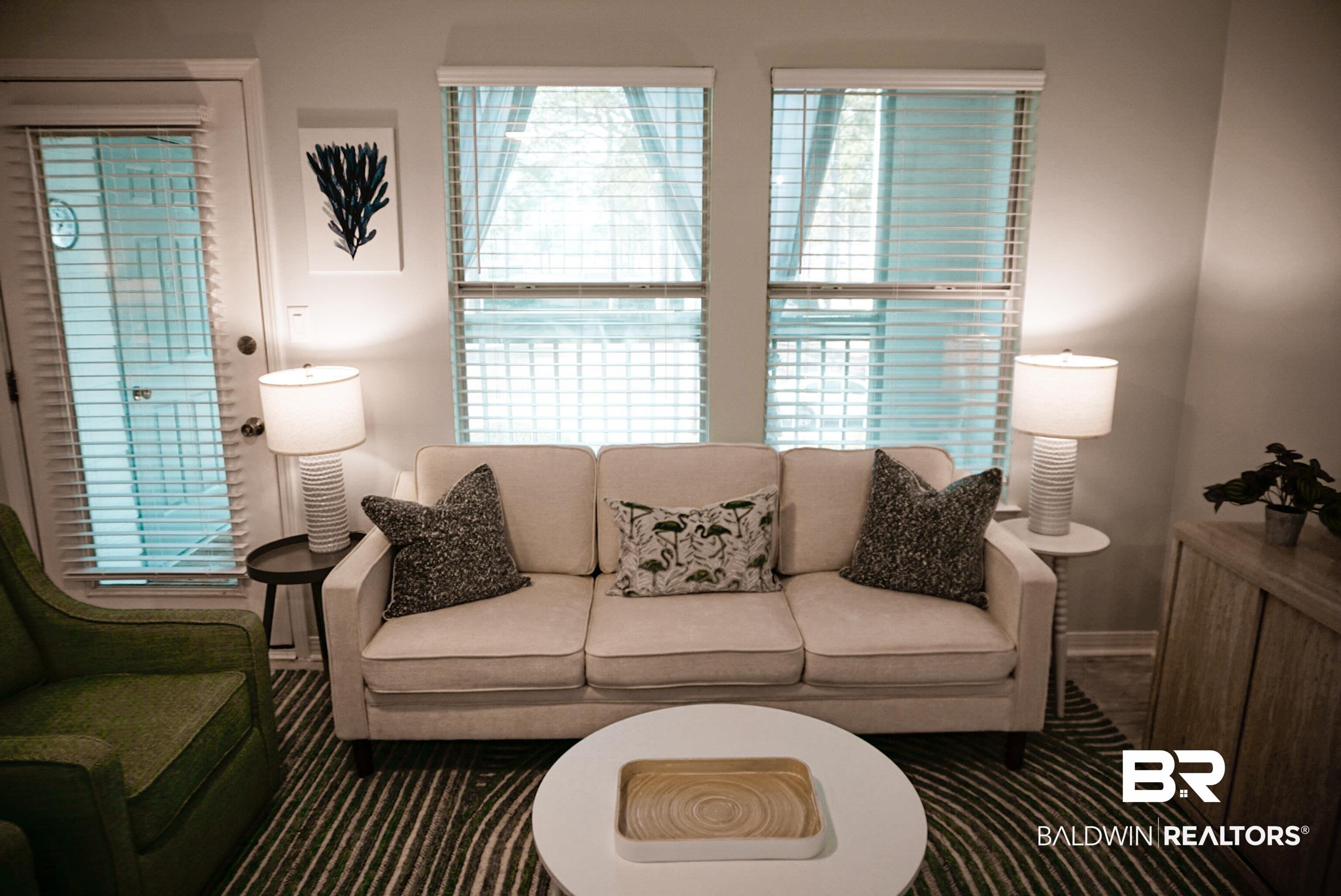 Image 4: Living room featuring baseboards