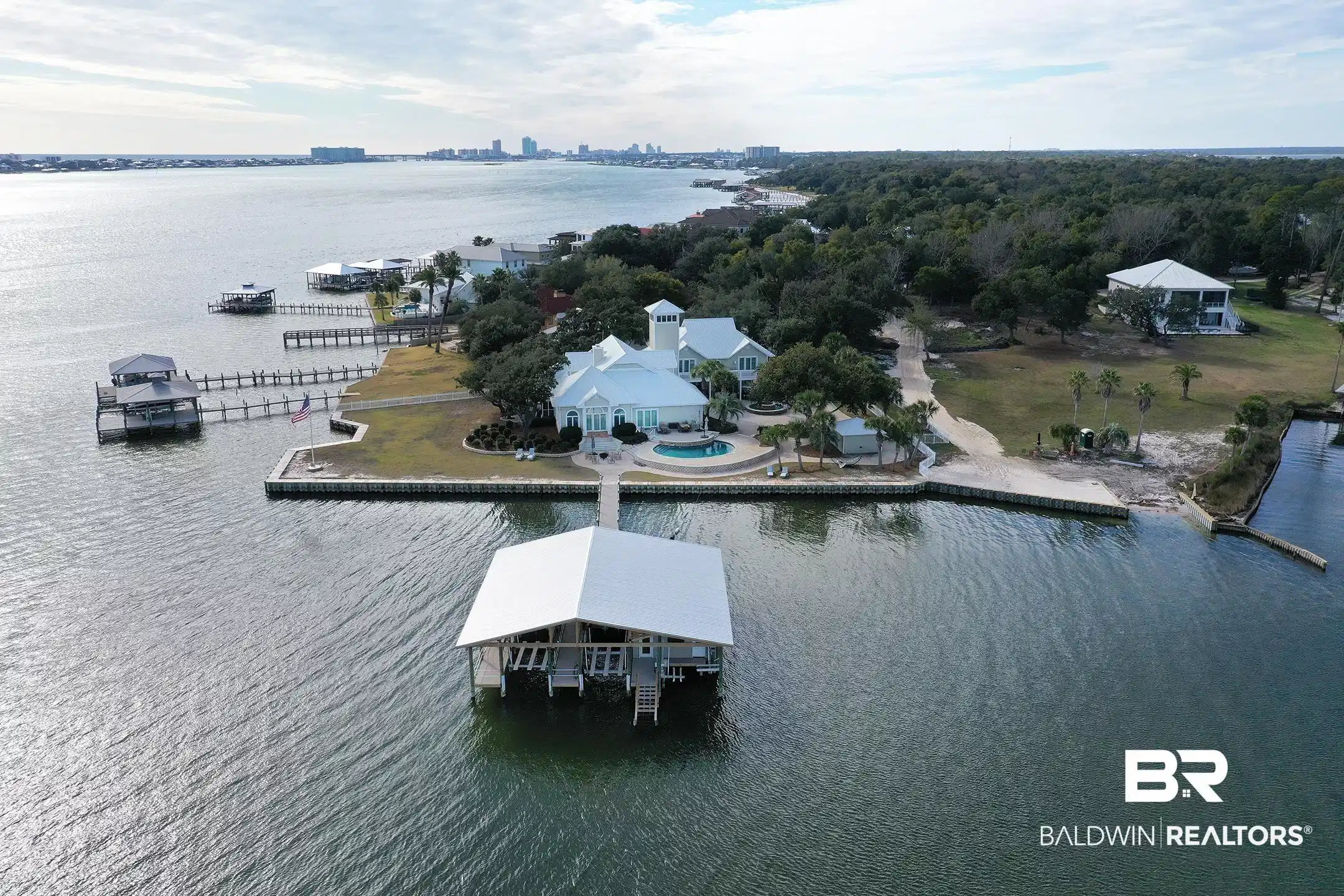 Image 1: View of urban area with a large body of water