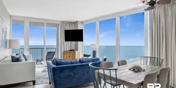 Image 4: Living room with floor to ceiling windows