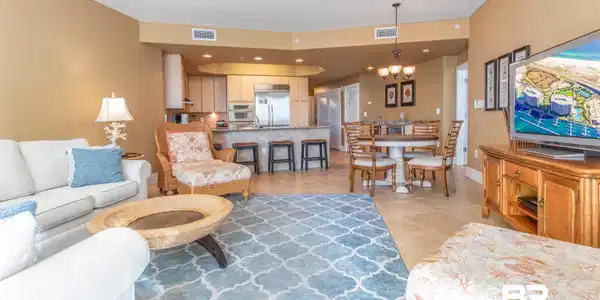 Image 3: Living room featuring a chandelier, recessed lighting, and light tile patterned flooring