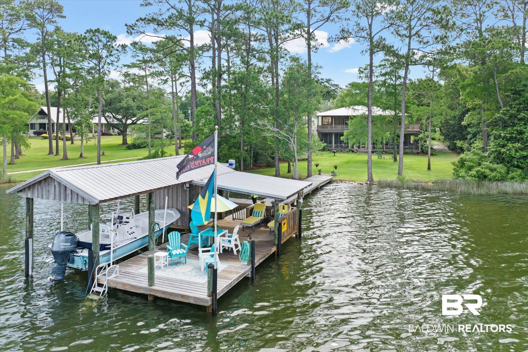 Image 3: Featuring the wharf area and boat lifts.