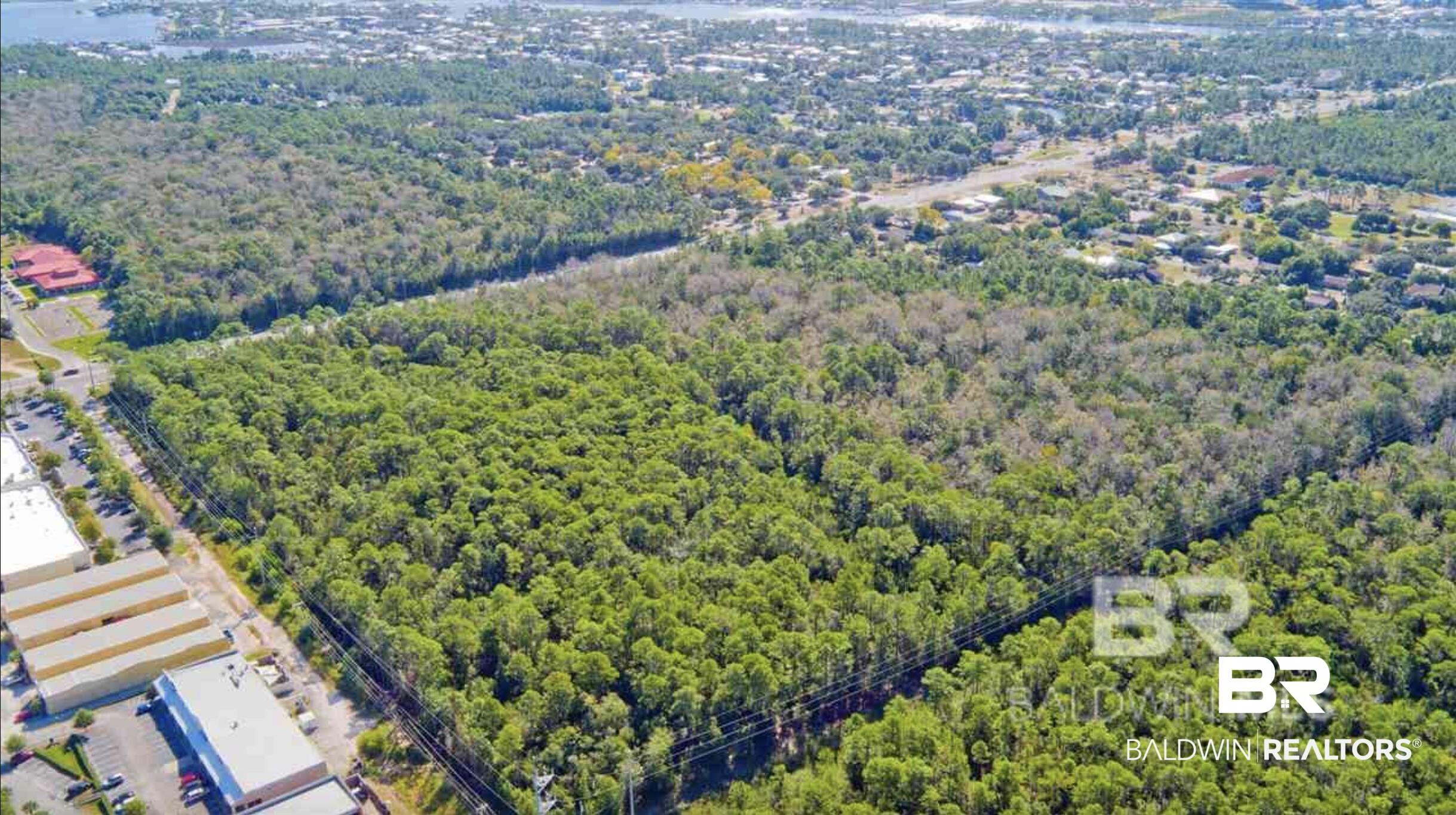 Image 4: Drone / aerial view featuring a wooded view