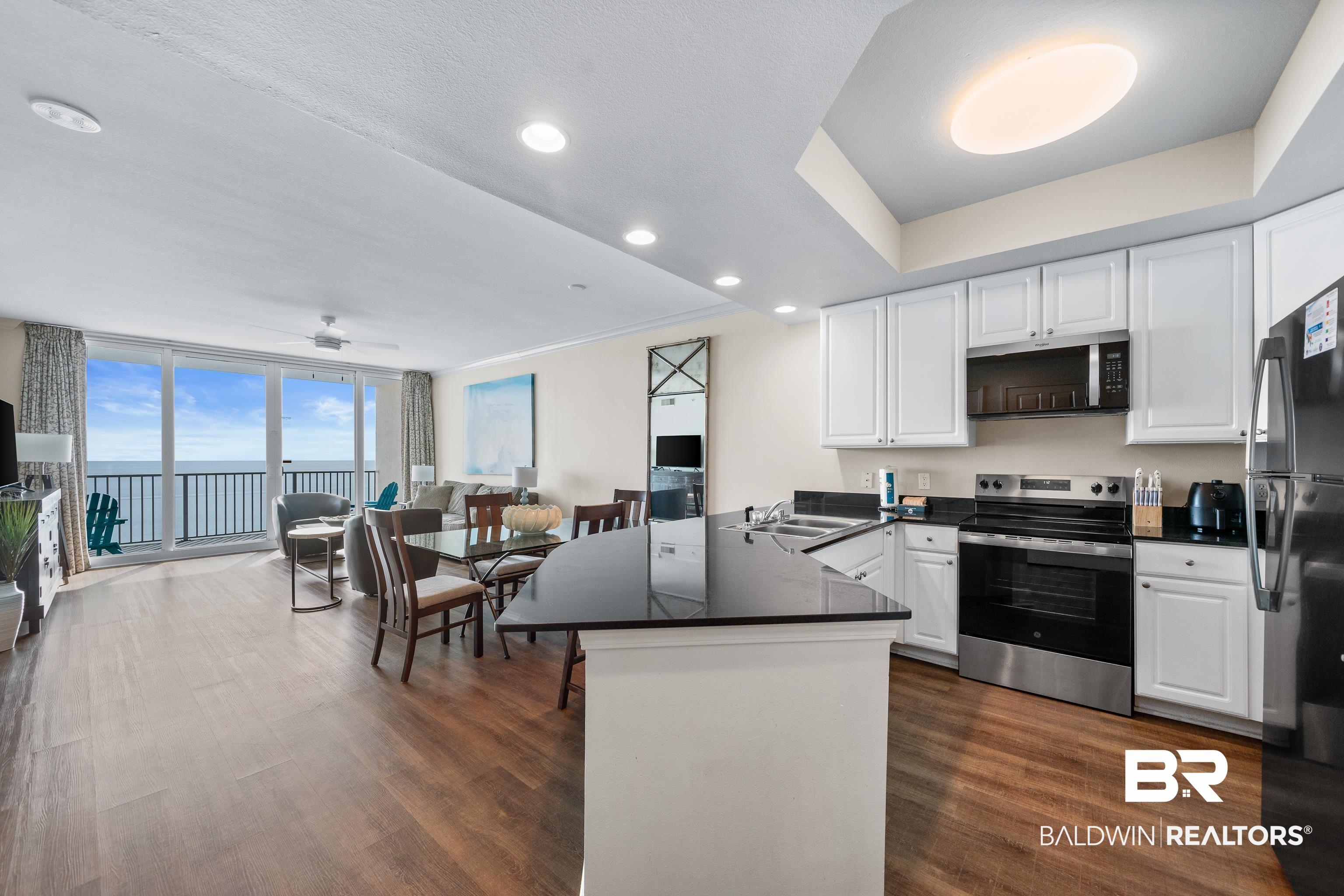 Image 2: Kitchen and Living from Foyer