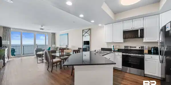 Image 2: Kitchen and Living from Foyer