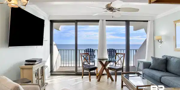 Image 2: Overlooking the Gulf of America. 65" Samsung UHD curved screen TV with hidden cable/internet wiring. Double crown molding. Beautiful tile flooring. Wall sconces. Ceiling fan with light.