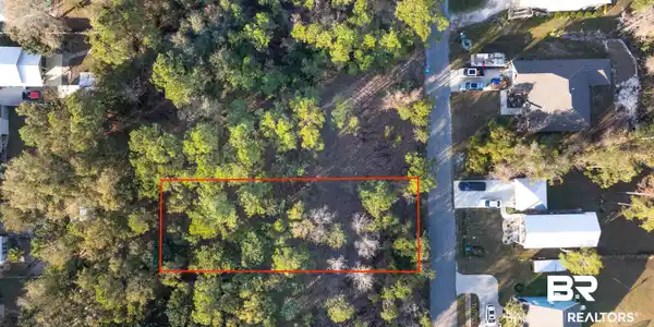Image 2: Aerial overview of property's location featuring property boundaries highlighted