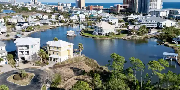 Image 3: View of urban area featuring a large body of water