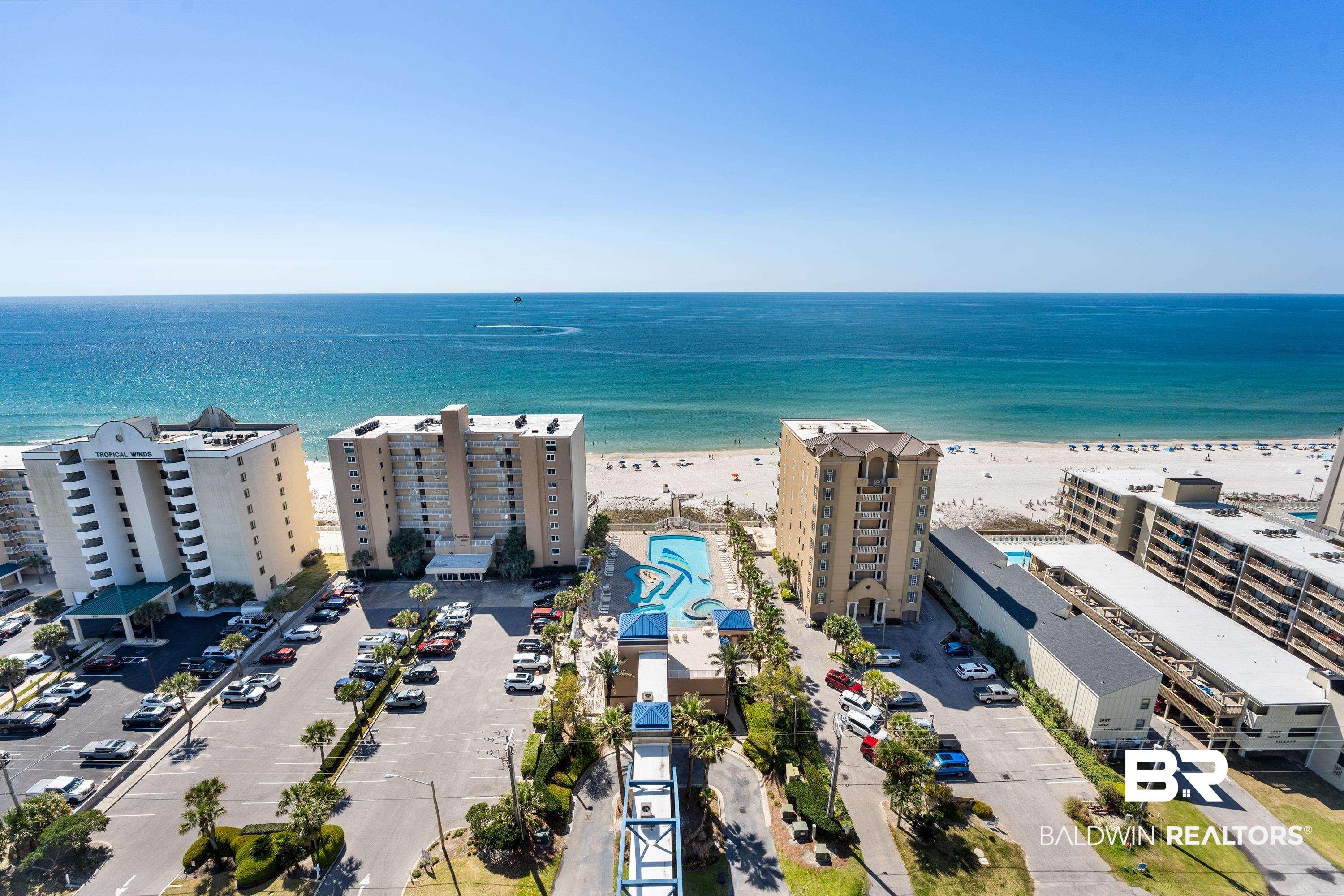 Image 2: Drone / aerial view of apartment complex / building and expansive beach