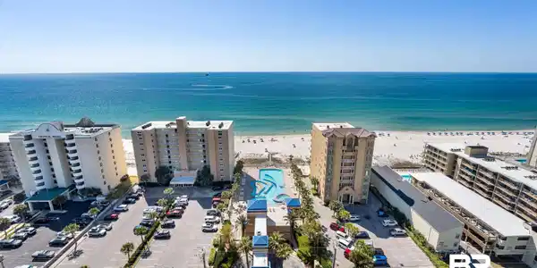 Image 2: Drone / aerial view of apartment complex / building and expansive beach