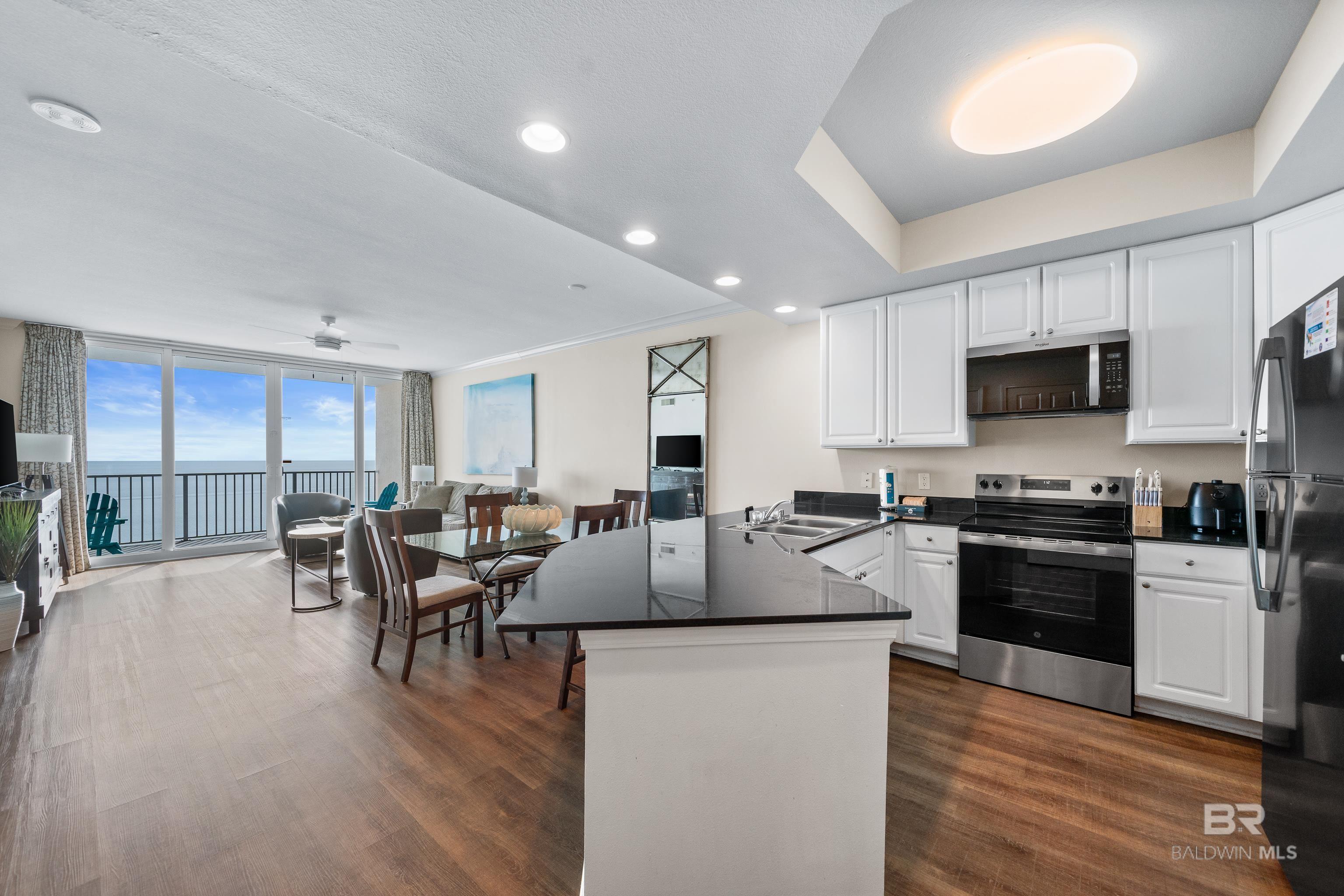 Image 2: Kitchen and Living from Foyer