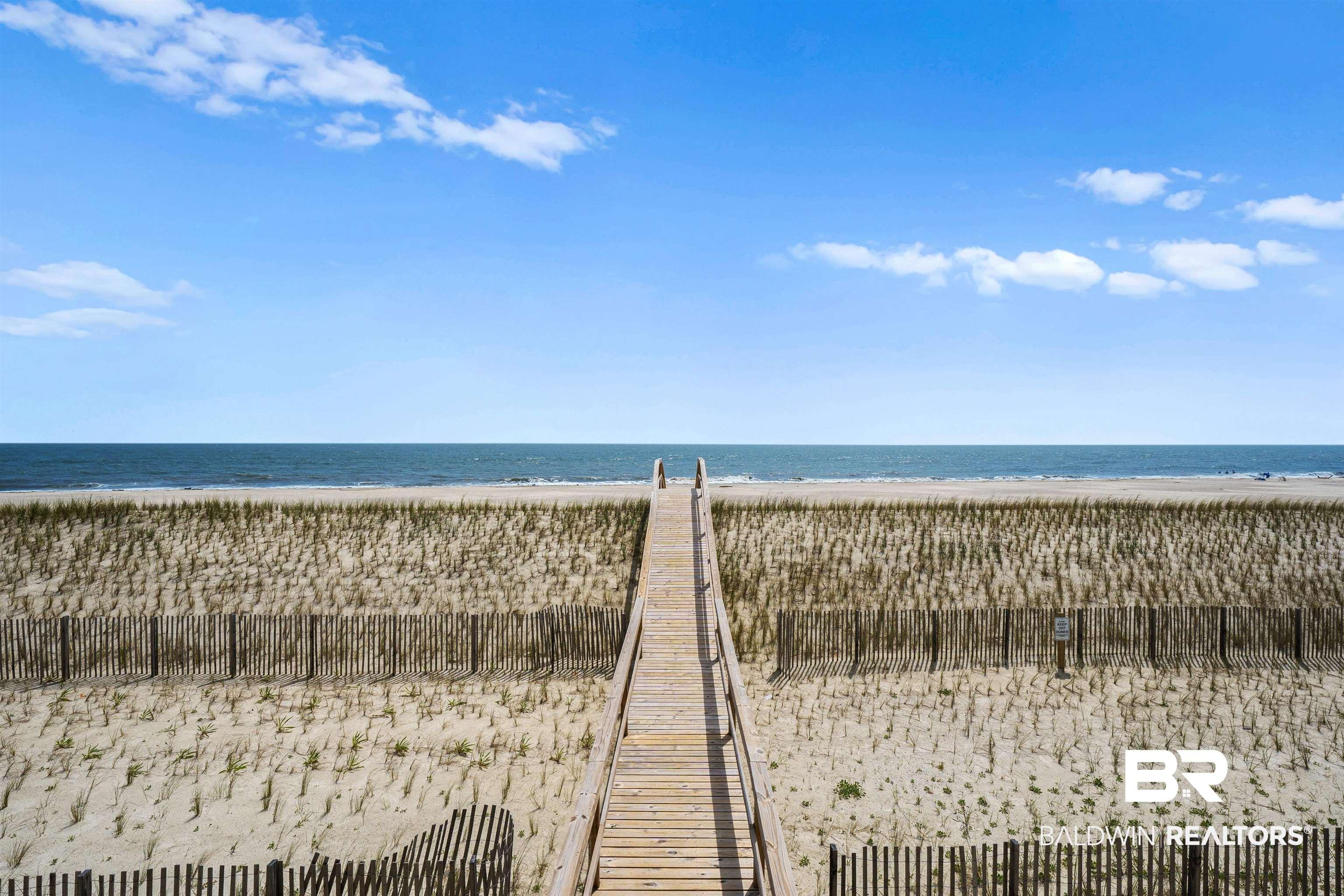 Image 4: Surrounding community featuring view of water and beach