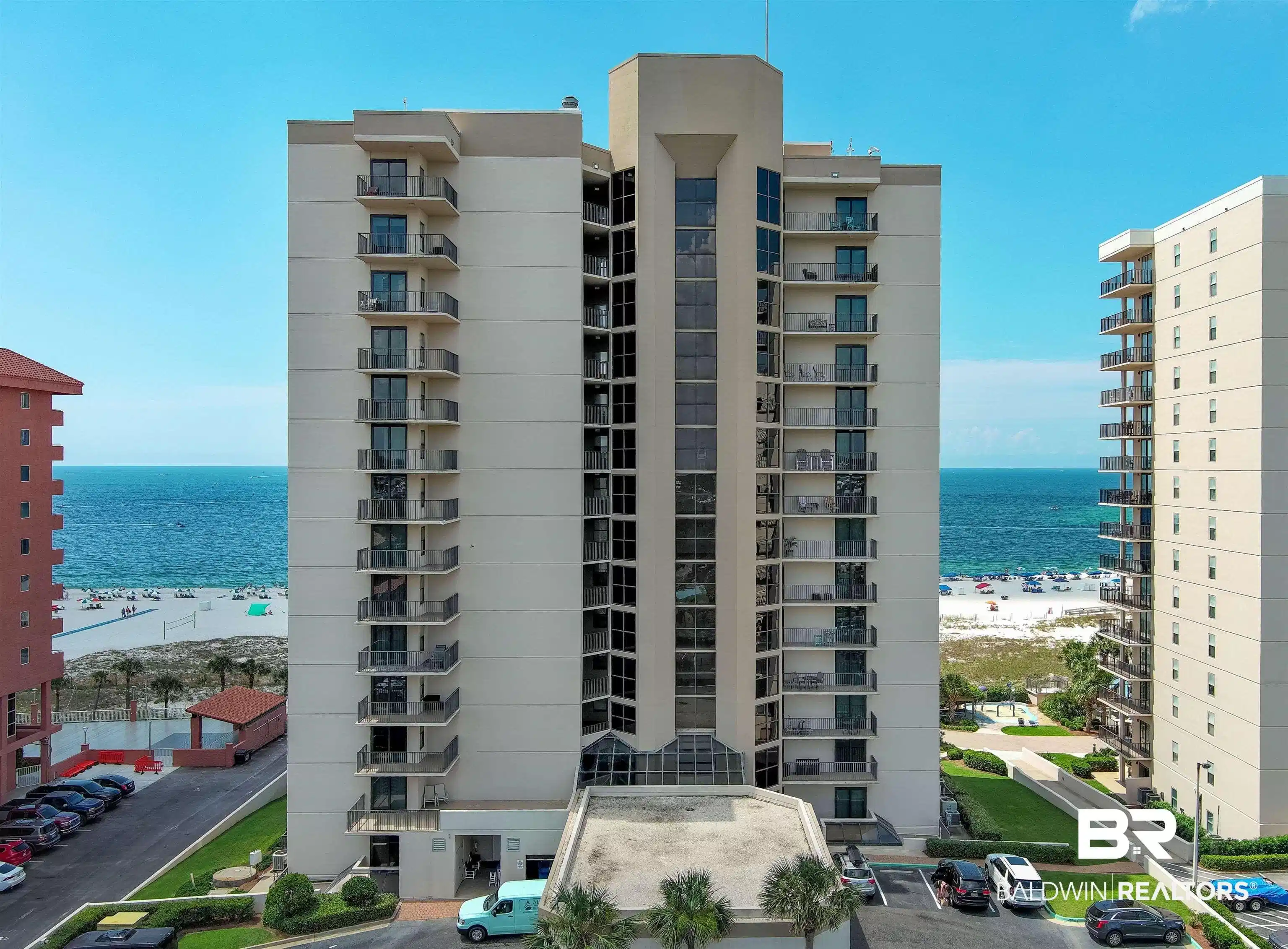 Image 1: View of apartment building / complex featuring a water view