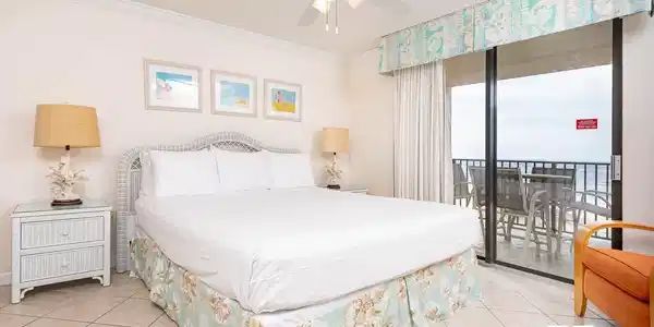 Image 2: Bedroom with access to outside, ceiling fan, crown molding, and light tile patterned floors