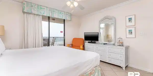 Image 3: Bedroom featuring ornamental molding, access to outside, a ceiling fan, and light tile patterned flooring