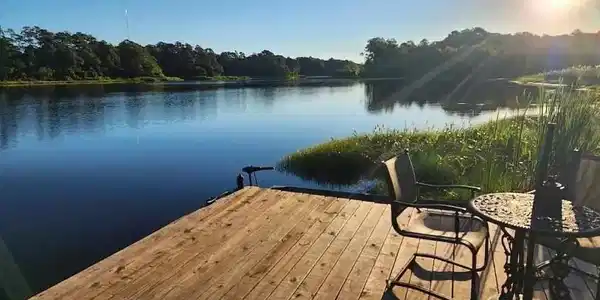 Image 2: Dock featuring a water view