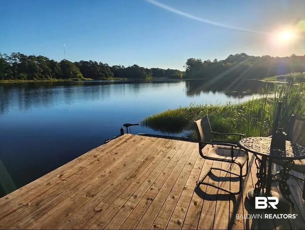 Image 2: Dock featuring a water view