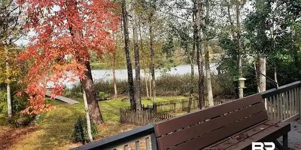 Image 3: Surrounding community with a water view