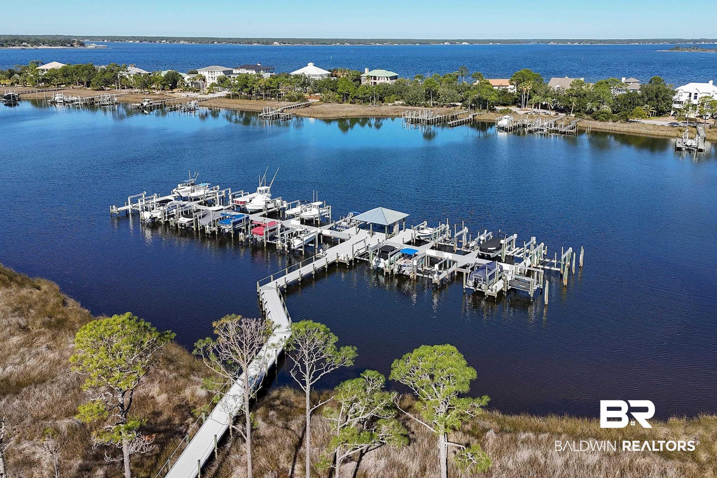 Image 2: Water view with boat slip and a dock